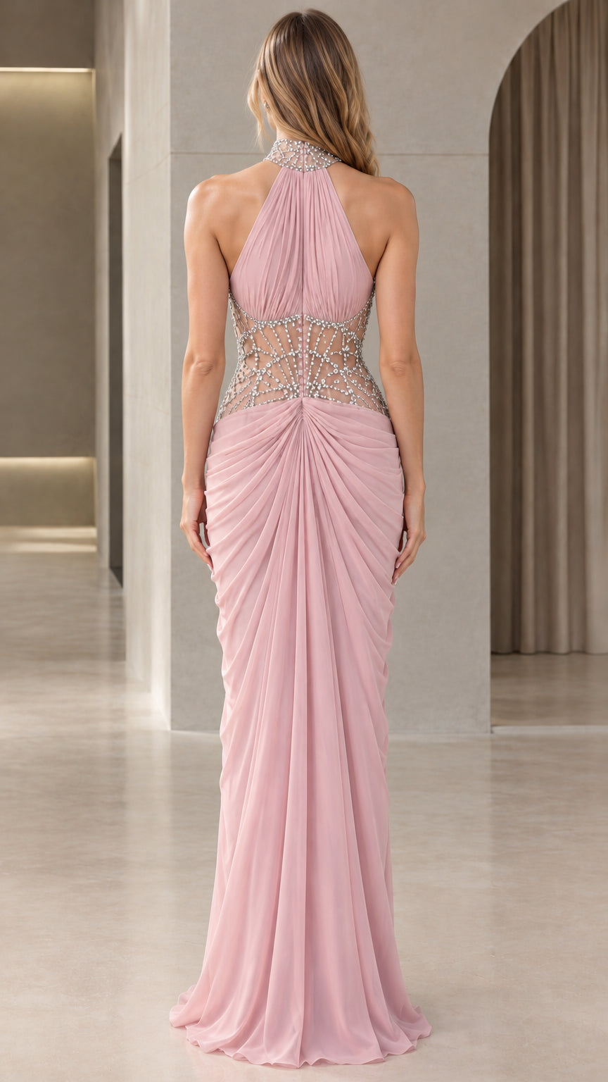 Back view of model in Blush Pink halter neck formal dress with open back design