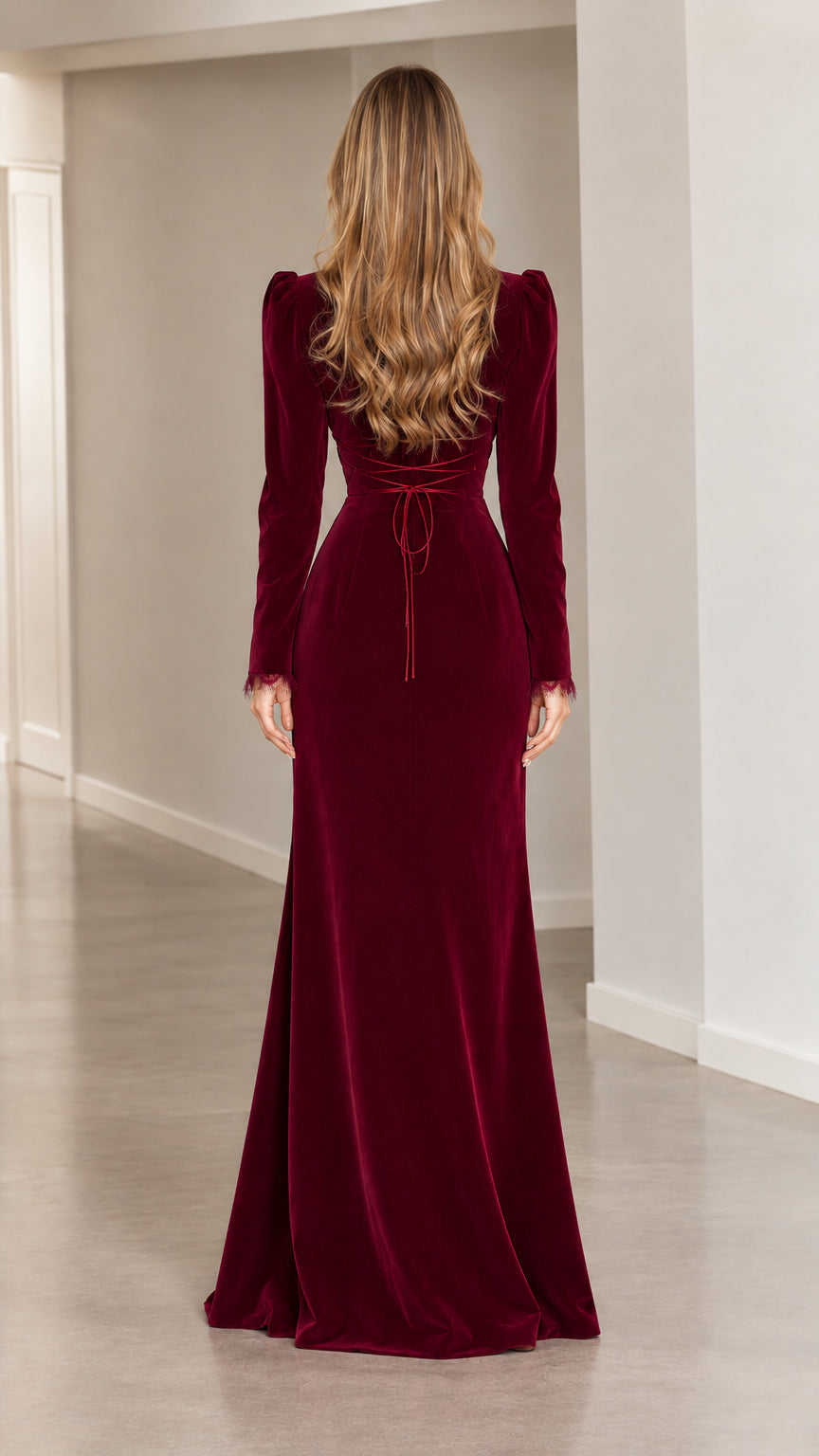 Back view of burgundy velvet dress showing adjustable lace-up waist tie