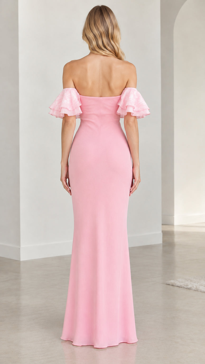 Back view of model wearing pink sweetheart neck maxi gown