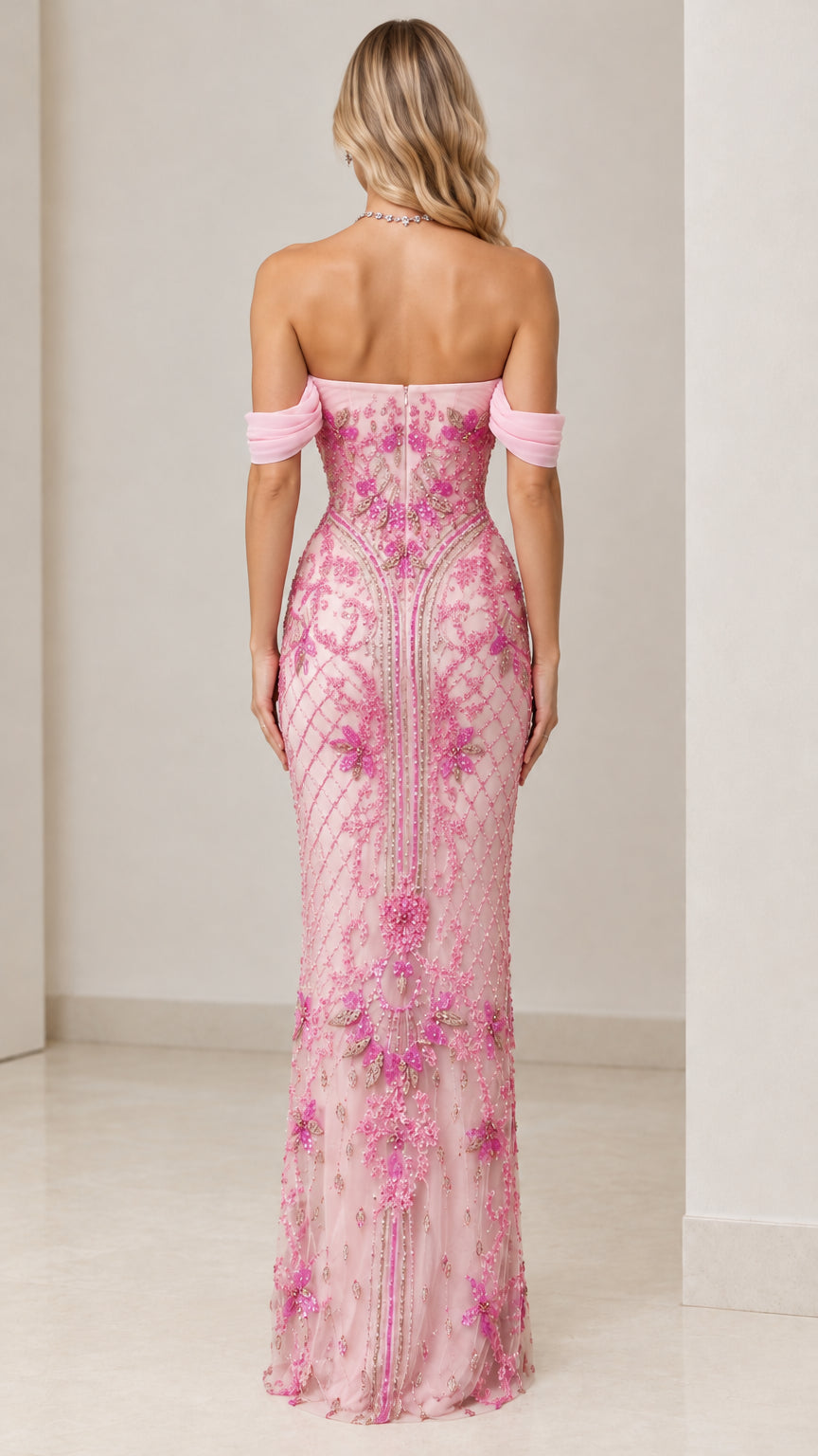 Back view of model wearing Blush Pink floor-length evening gown