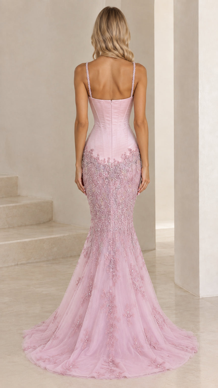 Blush pink embellished mermaid gown back view with flared train