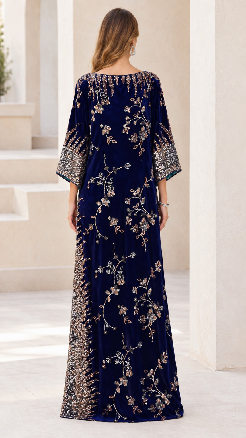 Back view of navy blue velvet maxi dress with floral sequin embroidery