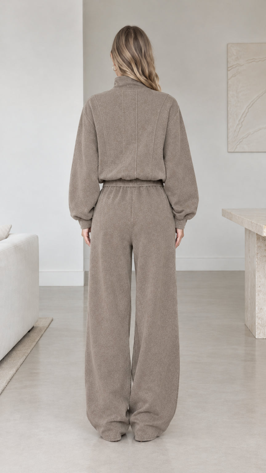 Back view of woman wearing taupe relaxed fit matching loungewear set
