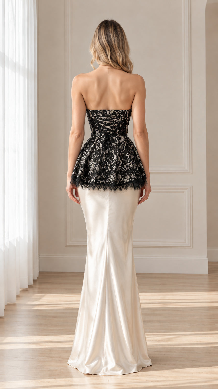 Back view of model in strapless lace gown showing lace-up corset back detail