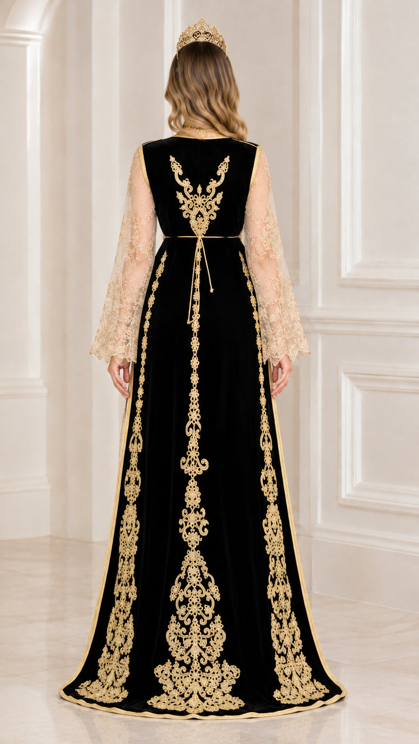 Back view of black velvet kaftan showing intricate gold back embroidery