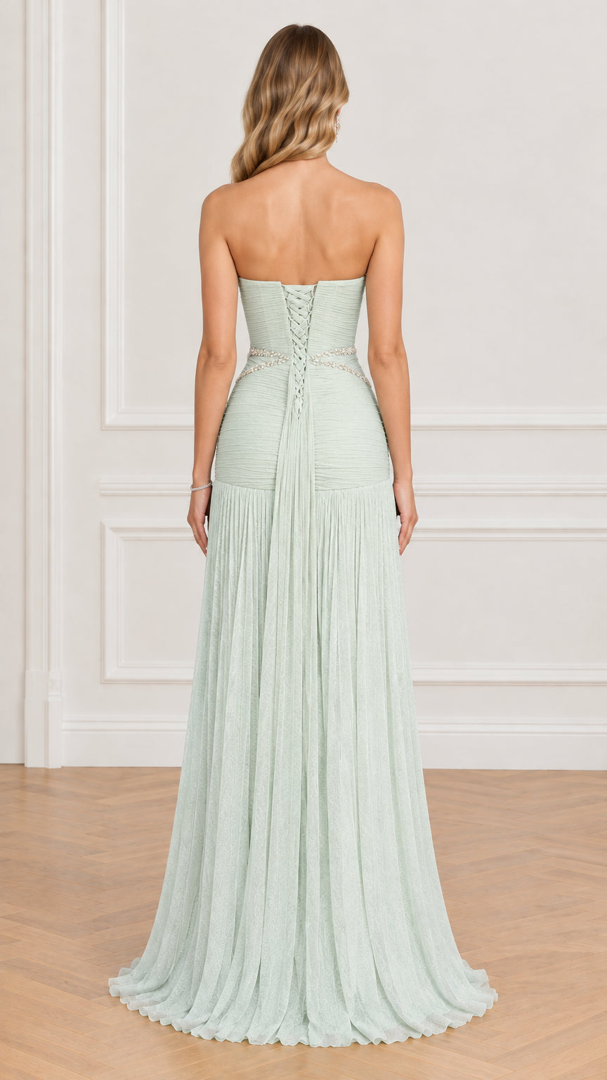 Back view of sage green evening dress showing lace-up corset closure