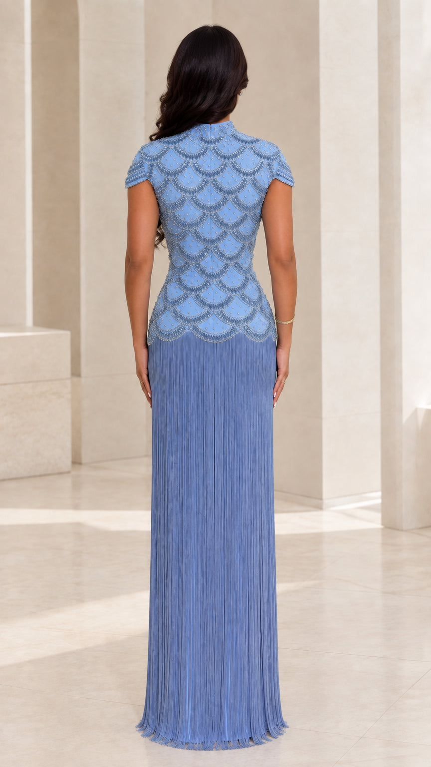 Back view of Dusty Blue beaded bodice floor length fringe gown