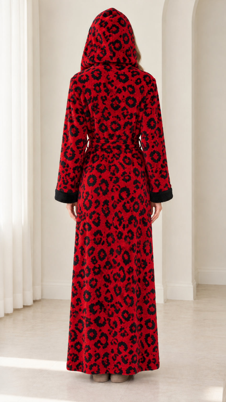 Back view of woman wearing hooded full-length red leopard fleece robe
