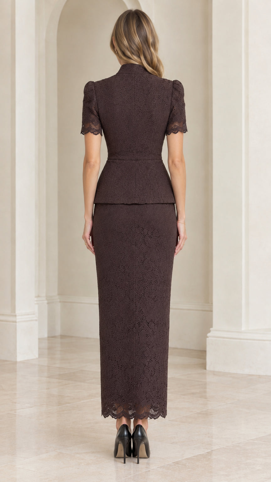 Back view of tailored espresso brown lace peplum top and column maxi skirt
