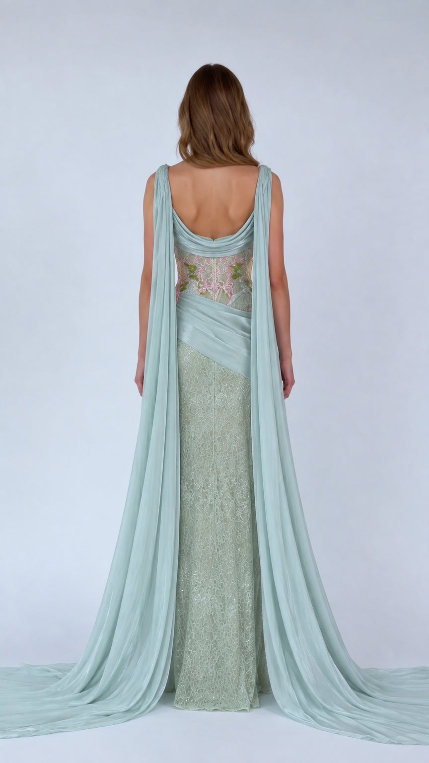 Back view of Sage Green formal dress showing draped open back and floor-length train