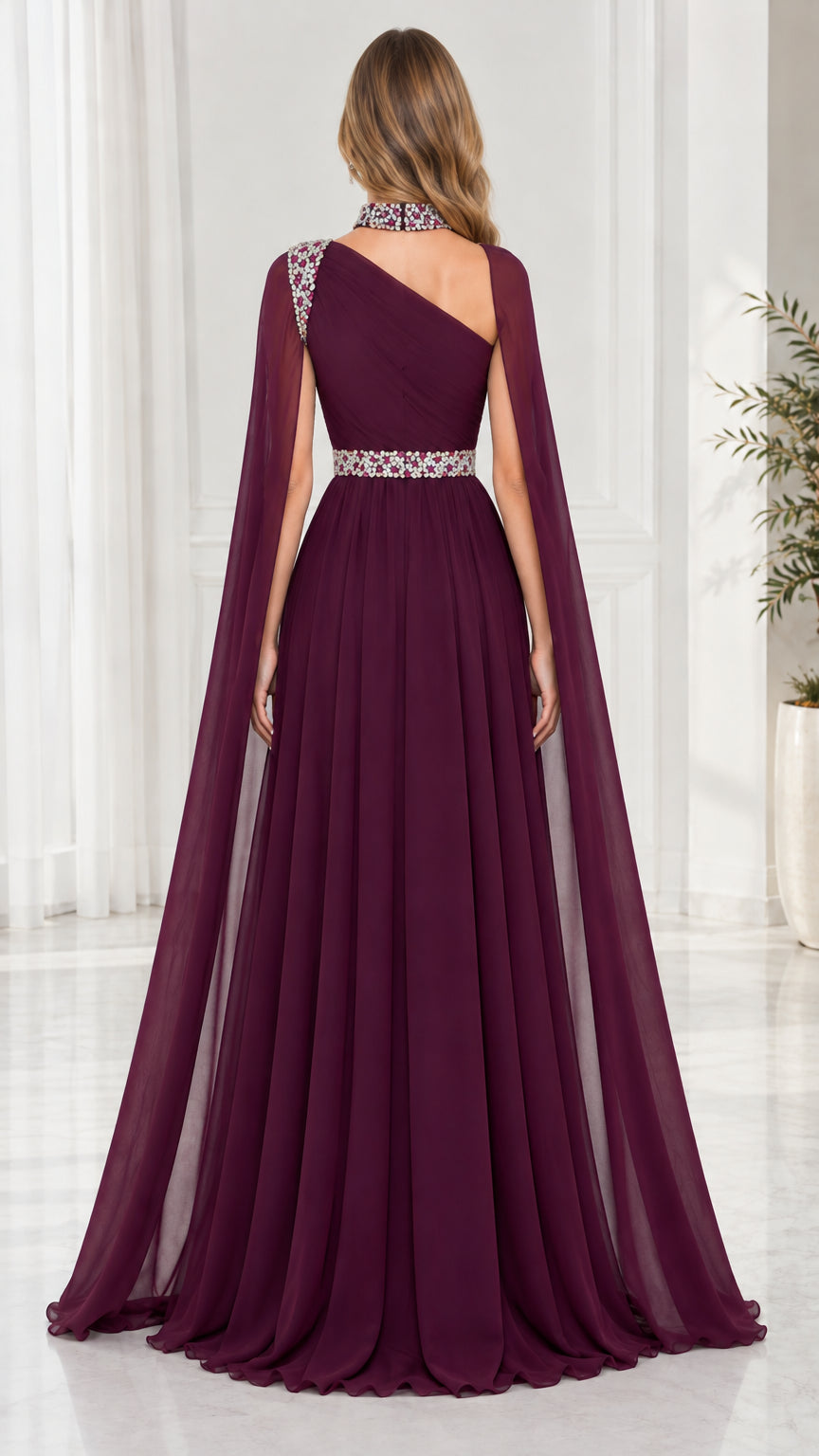 Back view of model in Burgundy one-shoulder maxi dress with sweeping cape