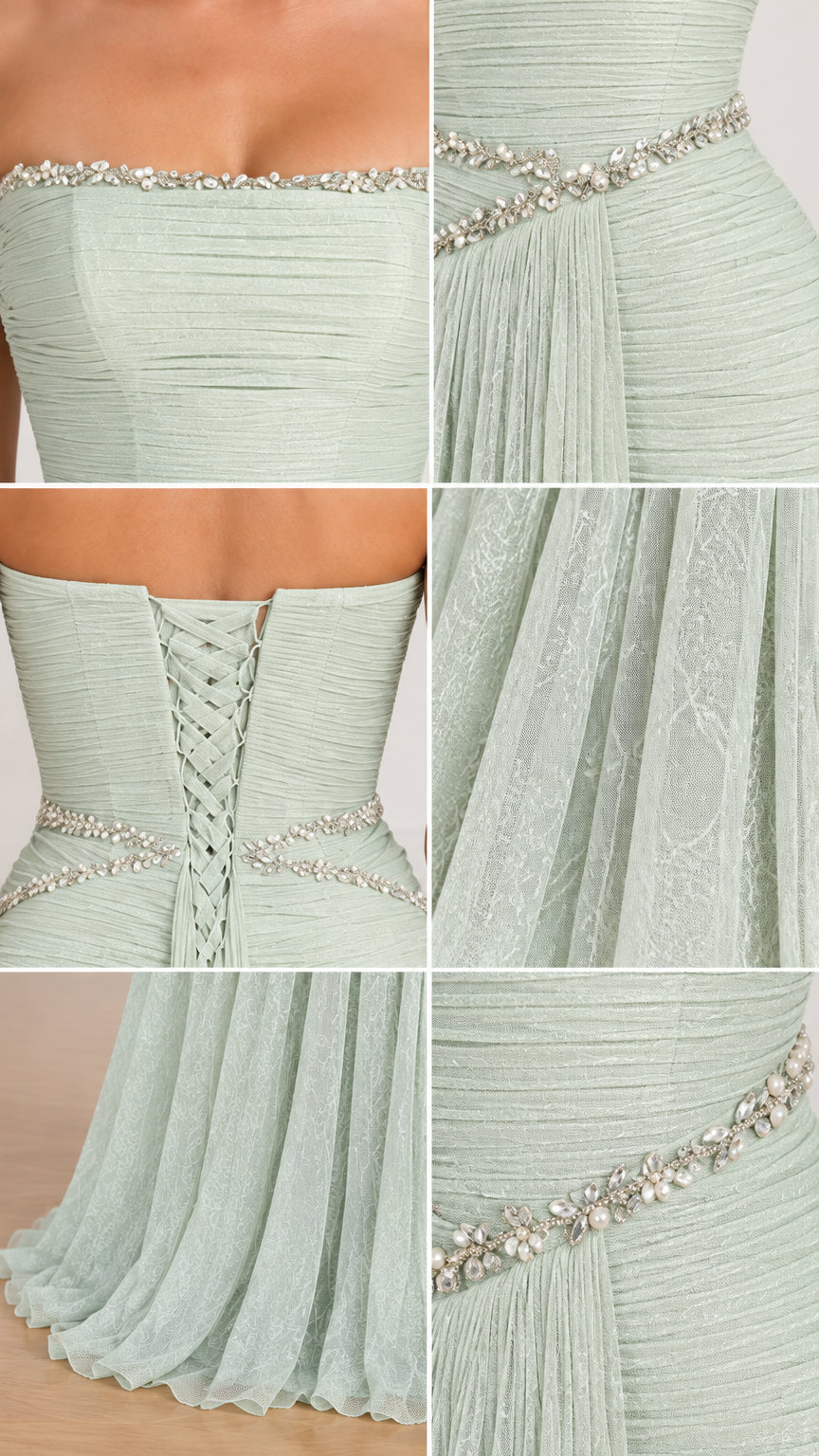 Close-up details of beaded neckline, waist trim, and pleated fabric texture