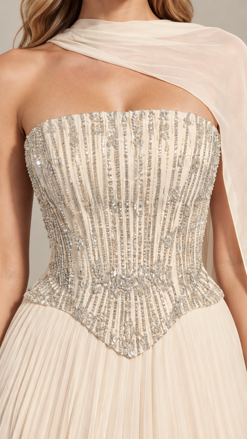 Close-up detail of silver beading on structured basque waist corset bodice