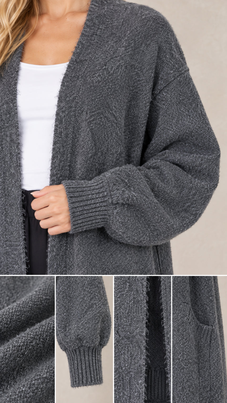 Close-up detail of soft textured knit fabric, pocket, and ribbed sleeve cuff