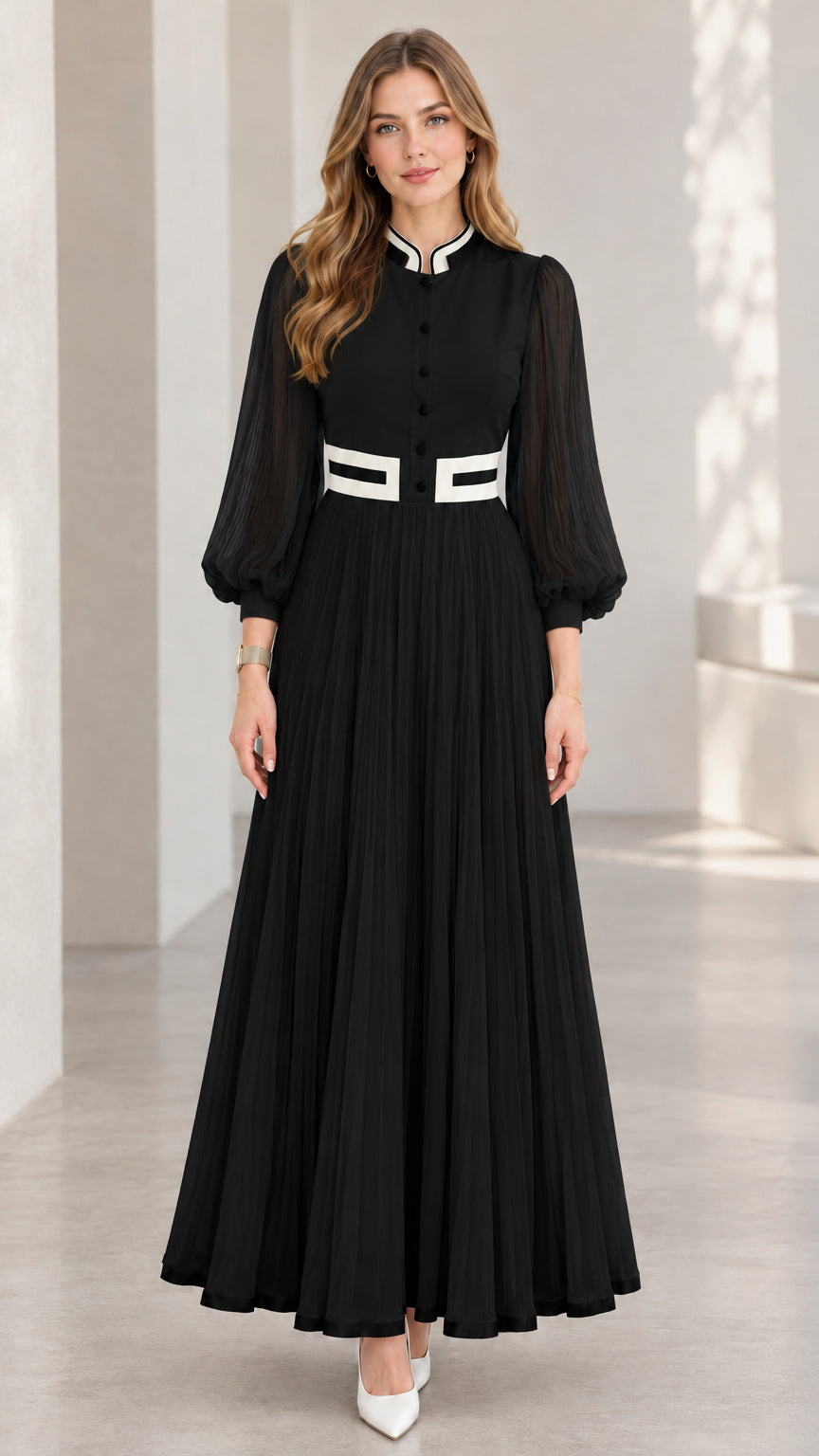 Black pleated maxi dress with white contrast trim and sheer lantern sleeves