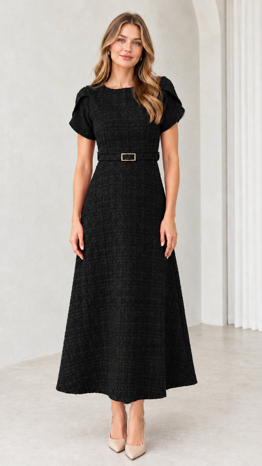 Front view of black textured tweed belted A-line midi dress