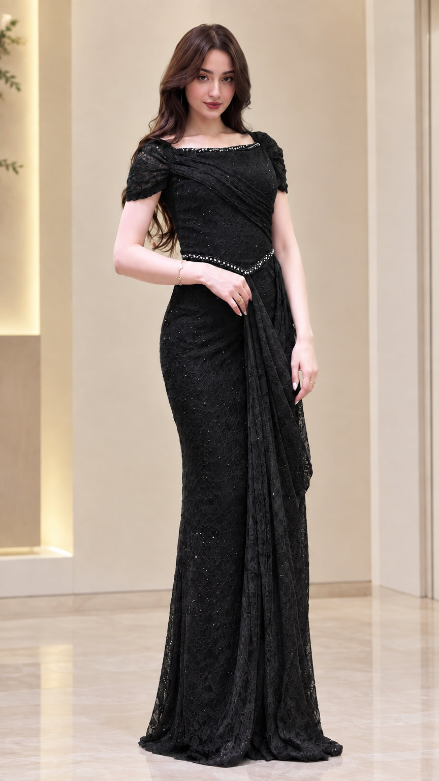Front view of model wearing Black embellished lace evening gown