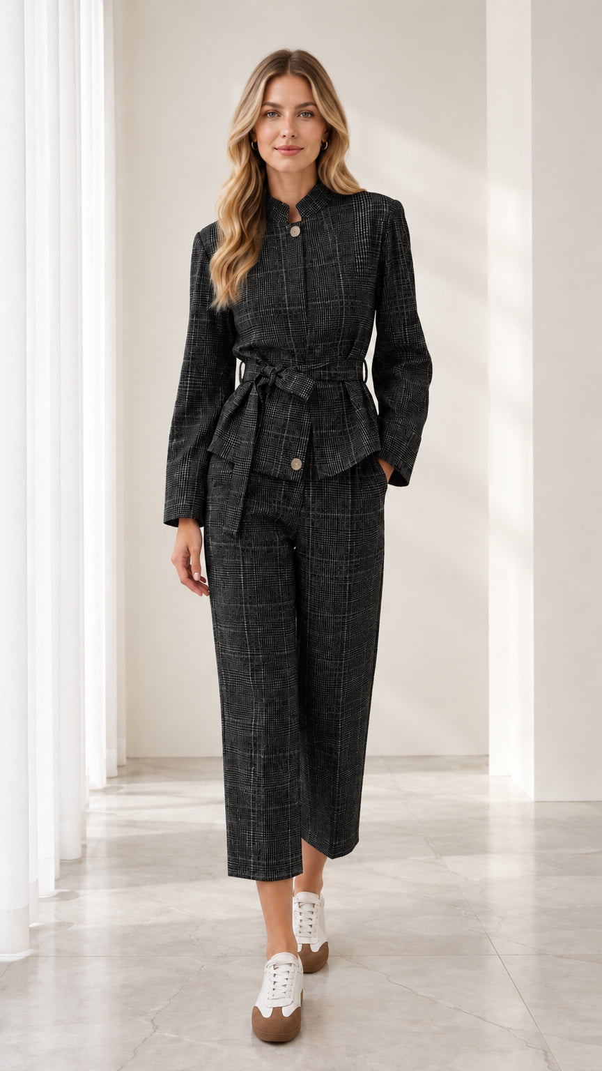 Full front view of model wearing charcoal black plaid belted two-piece pant suit set