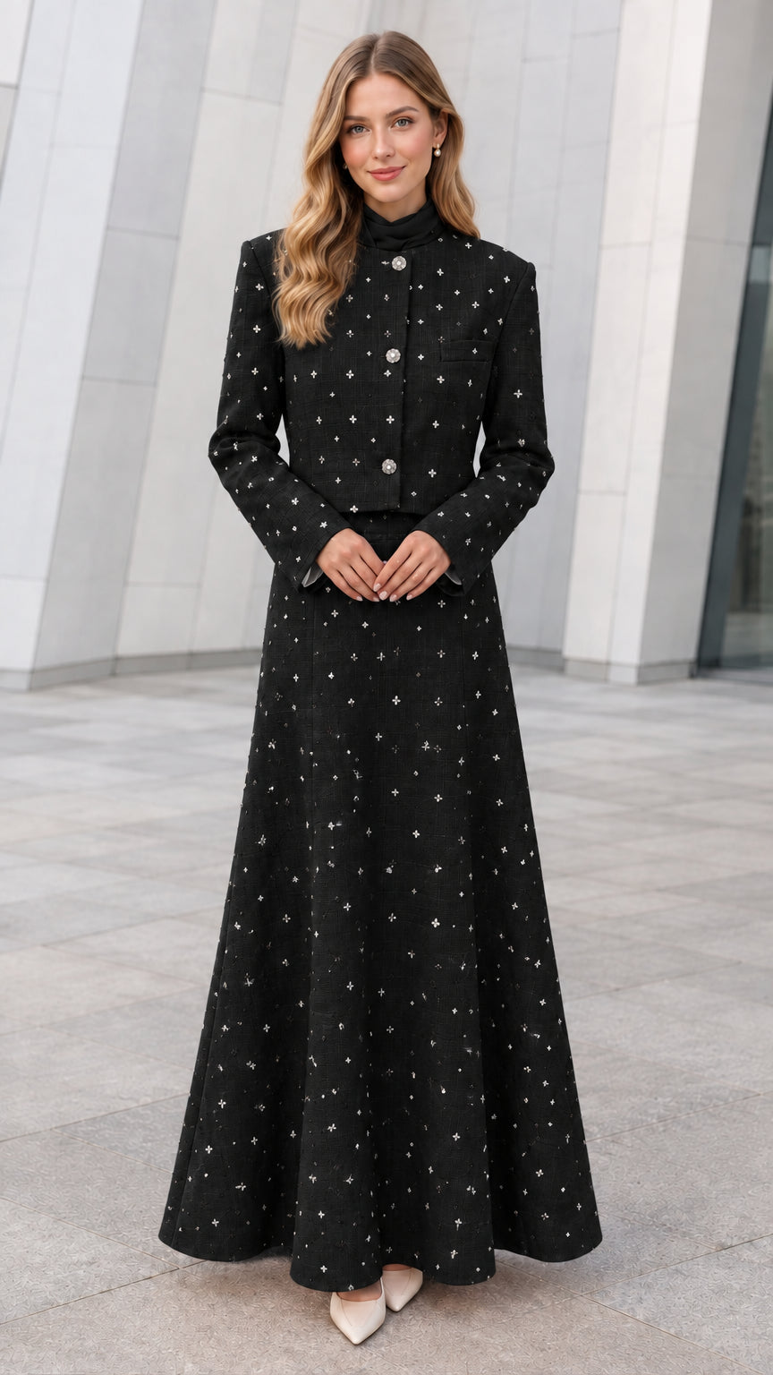 Front view of model wearing Black embellished tweed cropped jacket and maxi skirt set