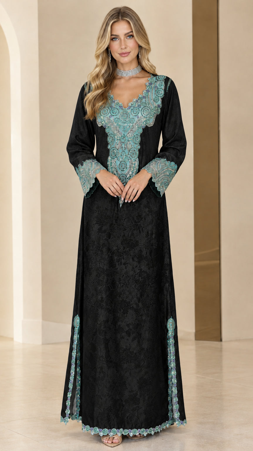 Front full-length view of woman in black embroidered kaftan maxi dress