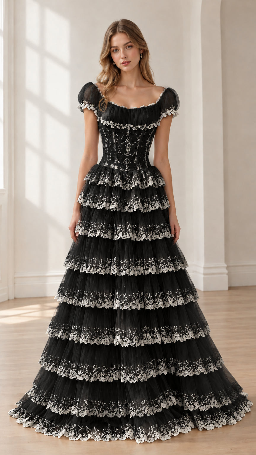 Black tiered lace corset ball gown with contrasting white lace hem