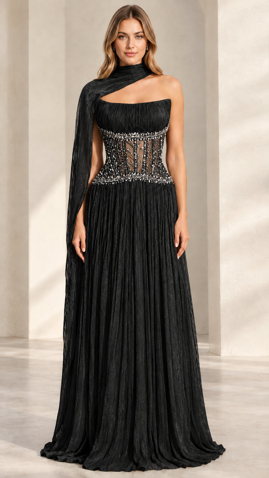 Black pleated evening gown with sheer embellished corset and draped neck scarf