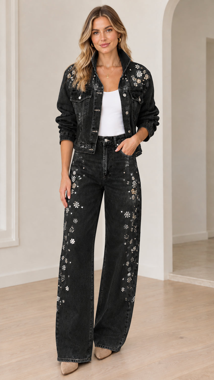 Model wearing washed black floral embellished denim jacket and wide-leg jeans set