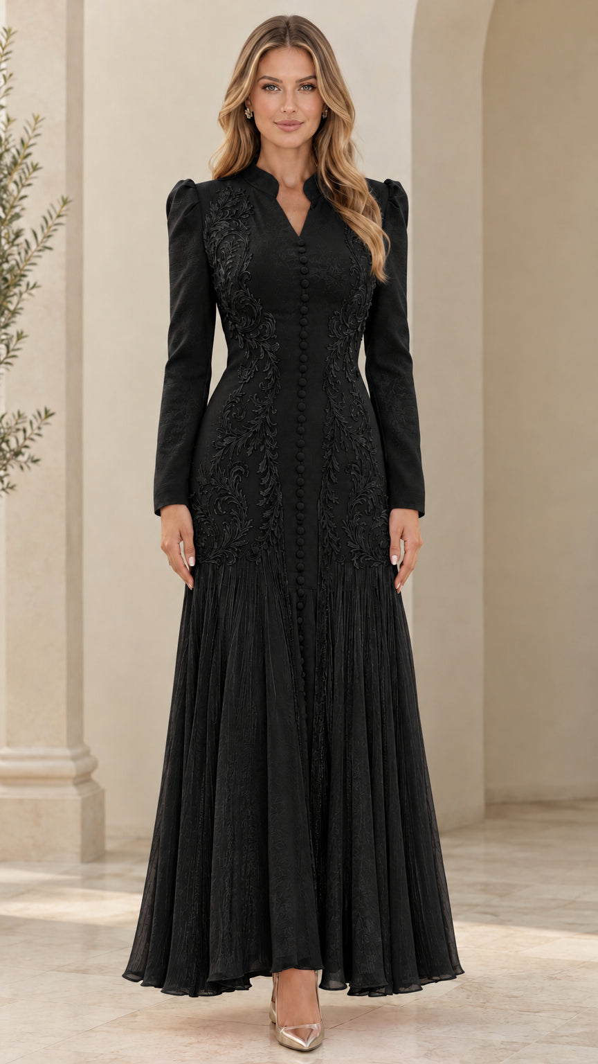 Front view of black long sleeve embroidered pleated maxi dress