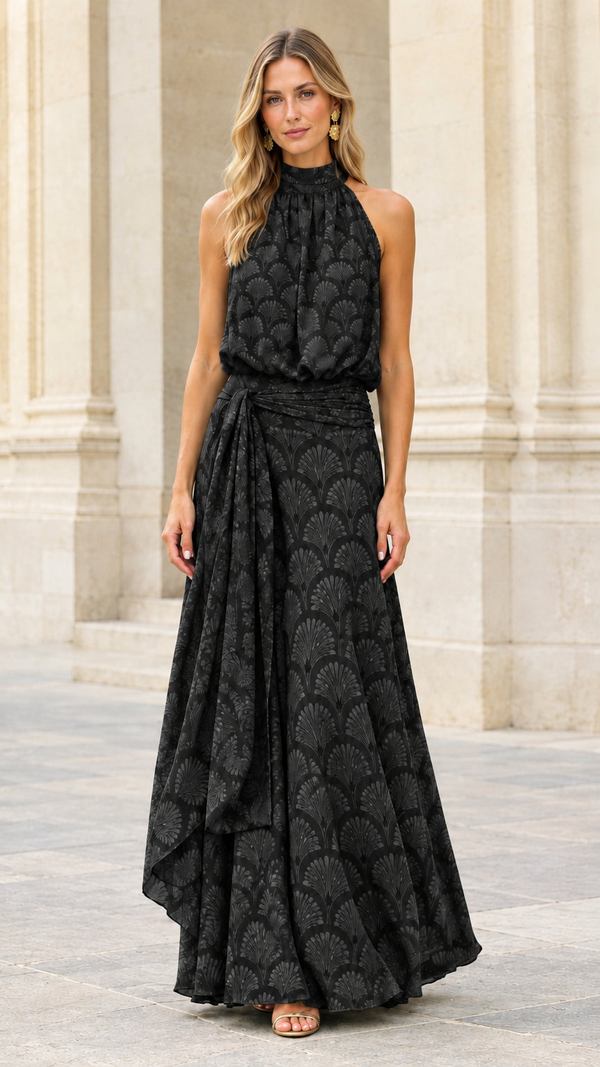 Front view of black halter neck pleated maxi dress with tie waist