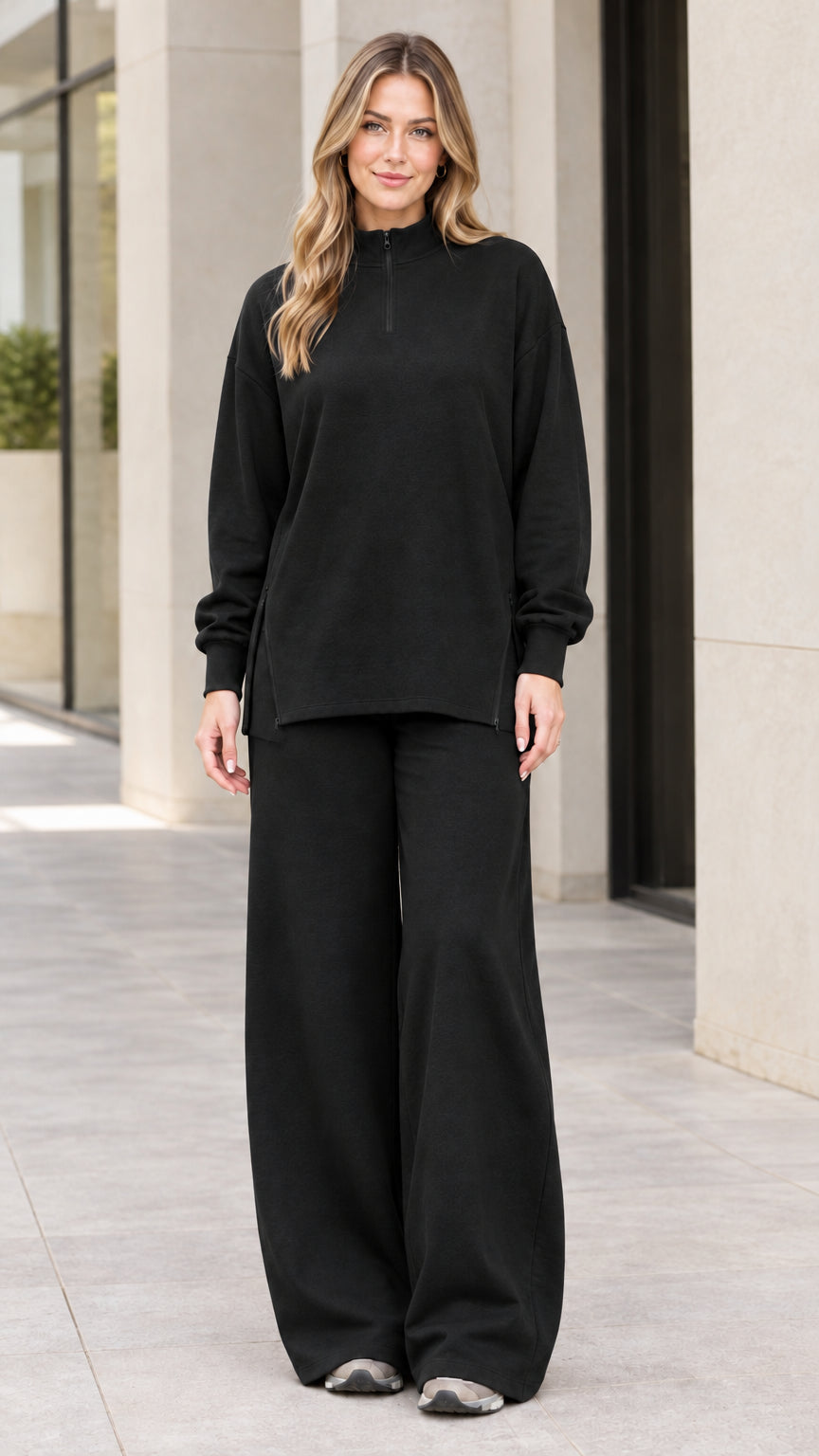 Women's black 2-piece quarter-zip pullover and wide-leg sweatpants set