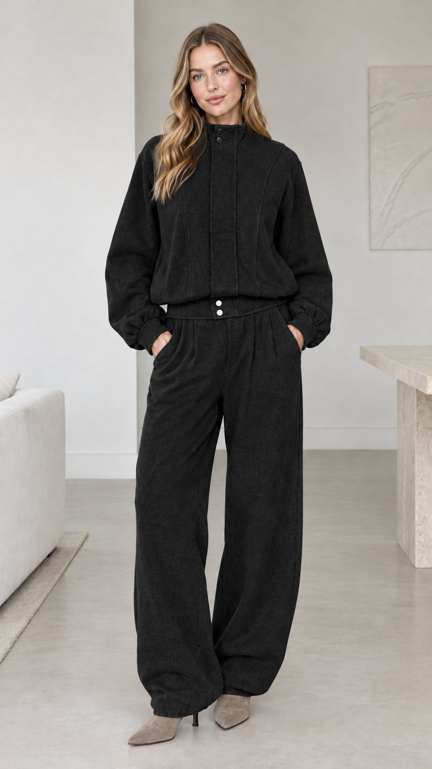Women's black high-neck long-sleeve top and wide-leg trousers matching set