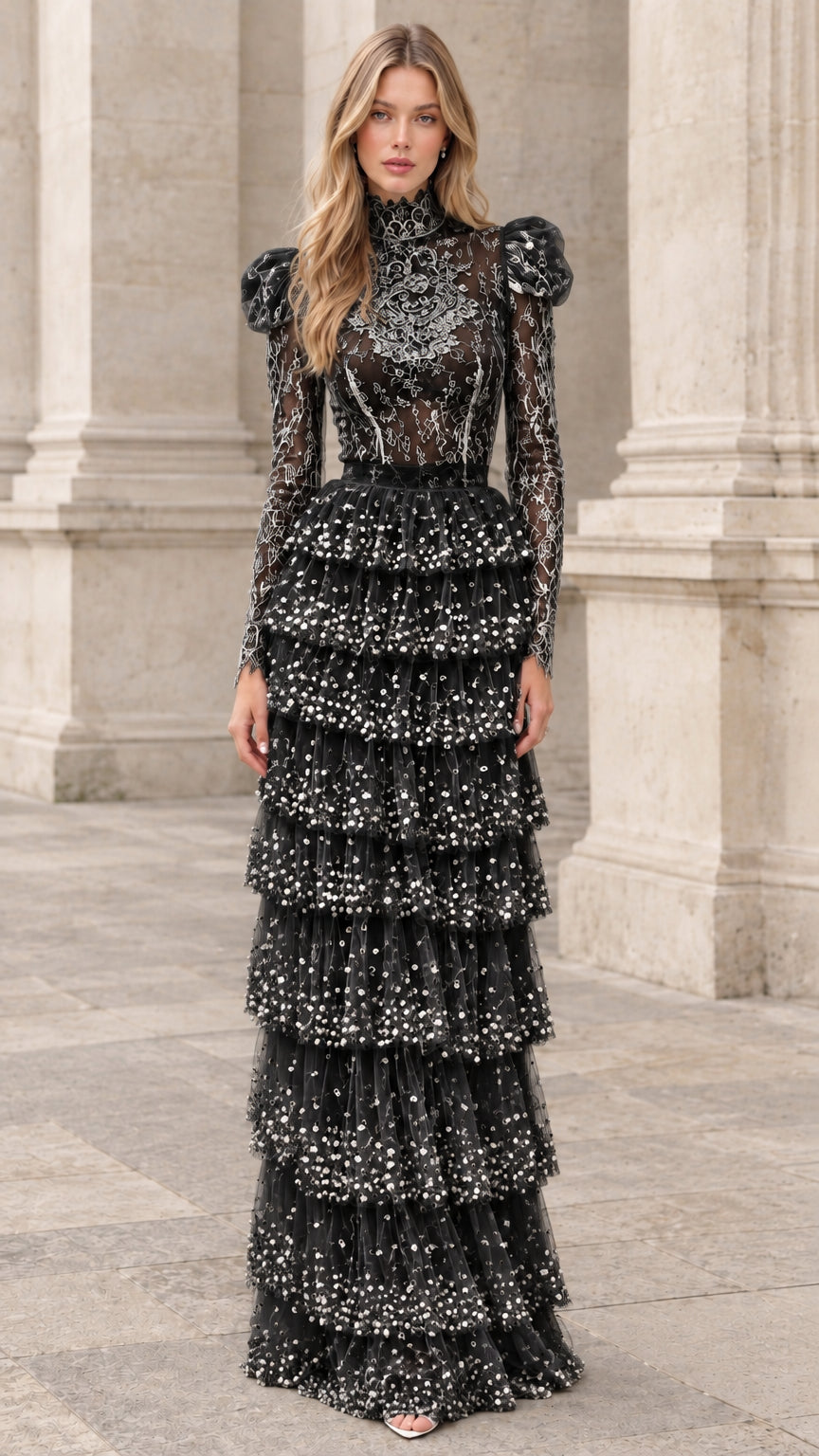 Front view of model wearing black high-neck tiered lace maxi evening dress