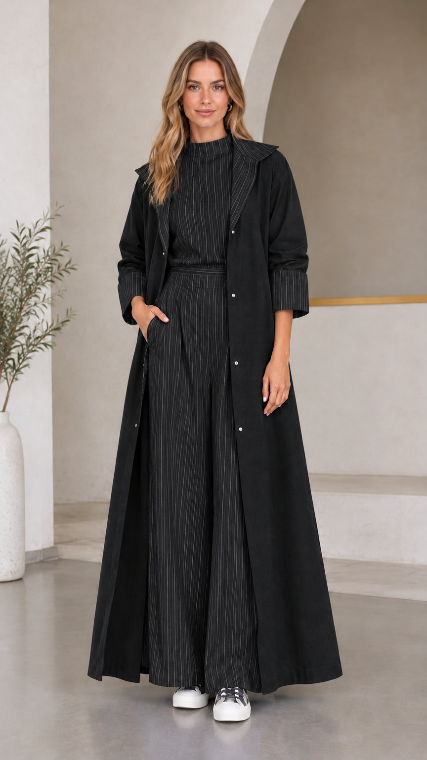 Women's monochrome black striped two-piece wide-leg set and matching black duster coat