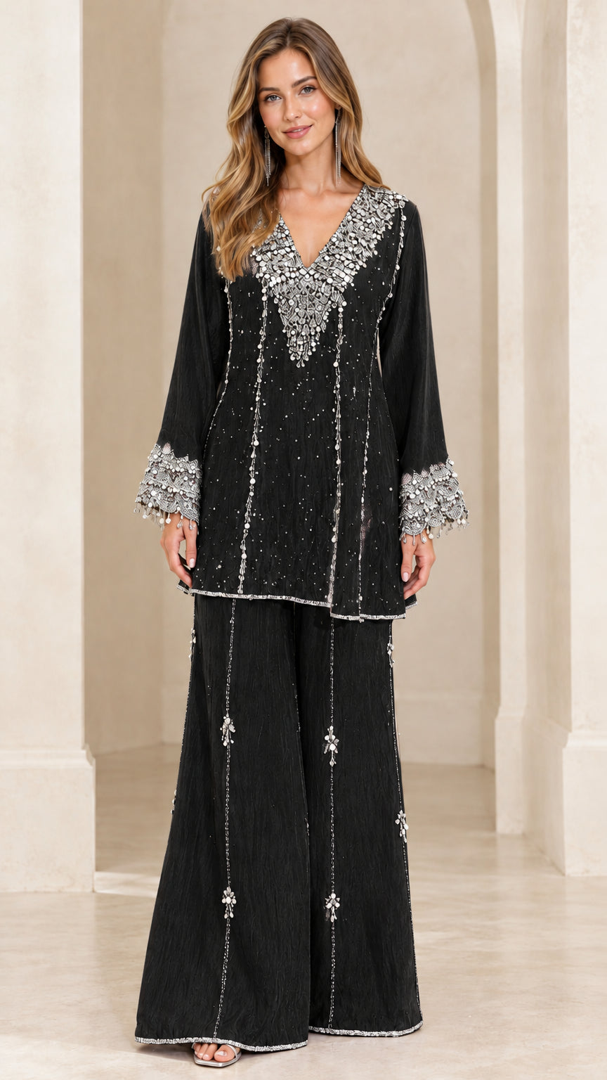 Front view of black sequin-embellished V-neck tunic and wide-leg pants set