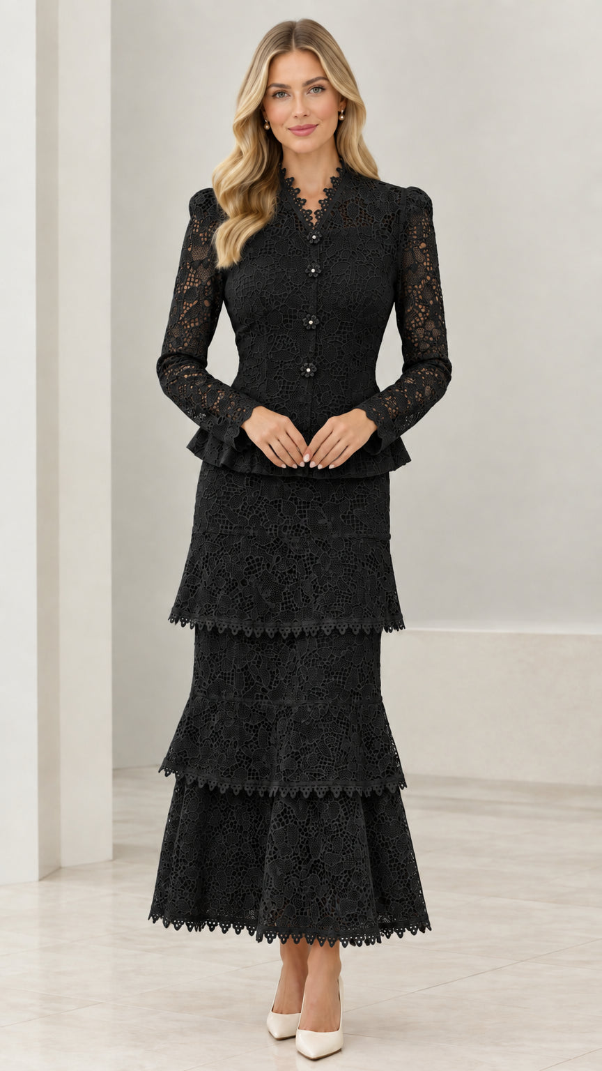 Front view of model in Black lace peplum jacket and tiered maxi skirt set