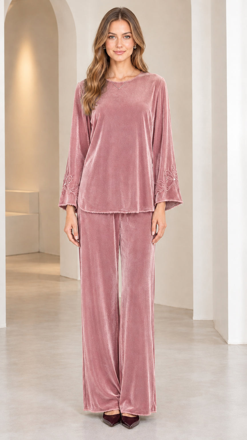 Model wearing Dusty Rose pink velvet two-piece matching set