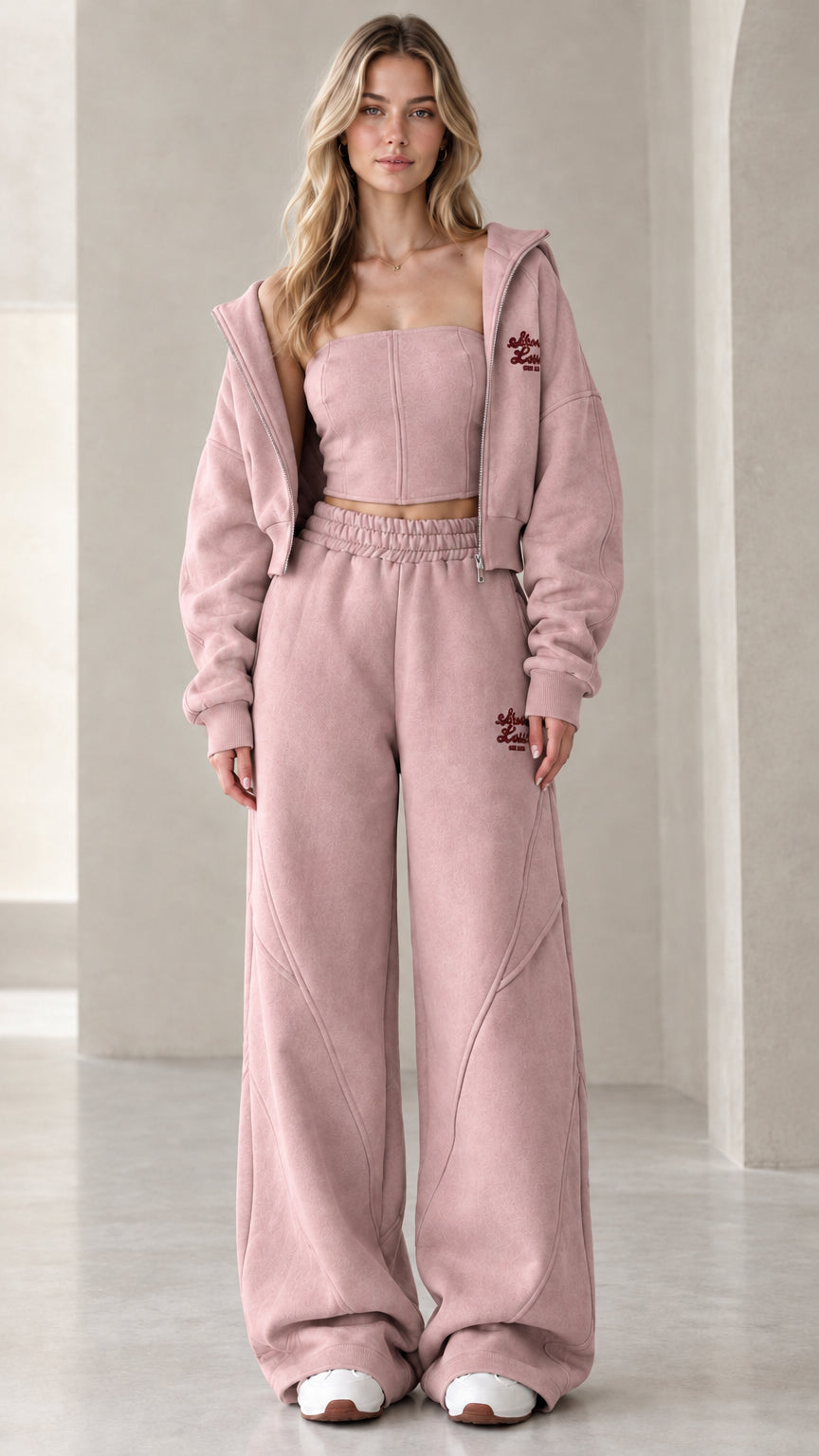 Full front view of model wearing the dusty pink 3-piece fleece tracksuit set