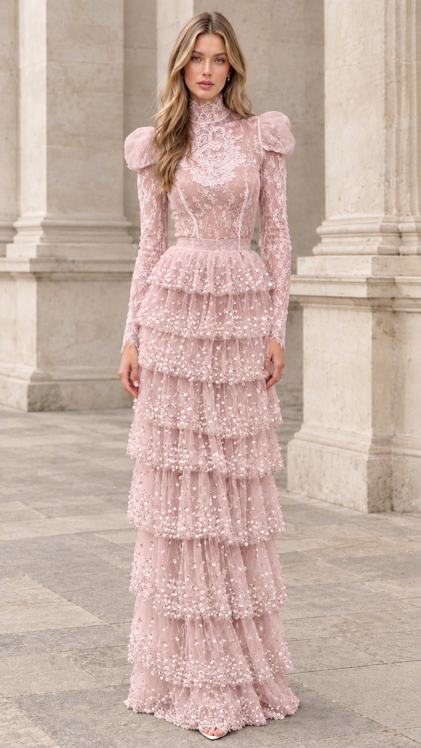 Front view of model wearing blush pink high-neck tiered lace formal dress