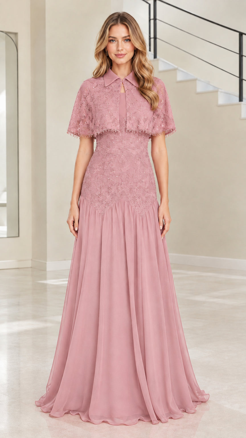 Woman wearing dusty rose pink chiffon maxi gown with capelet
