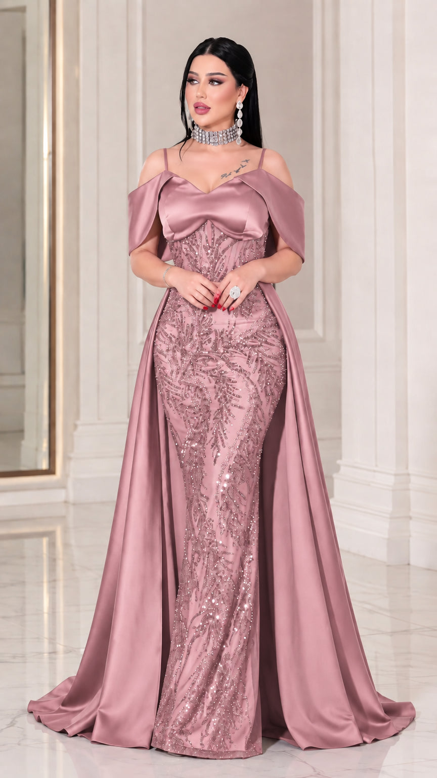Full-length front view of model wearing Dusty Rose beaded off-the-shoulder mermaid gown with overskirt