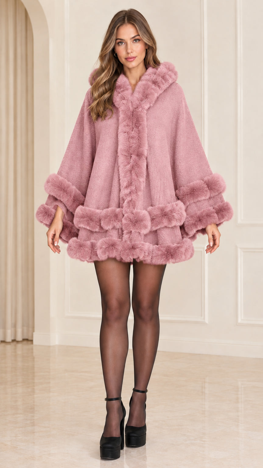 Front view of dusty pink faux fur trimmed hooded cape coat