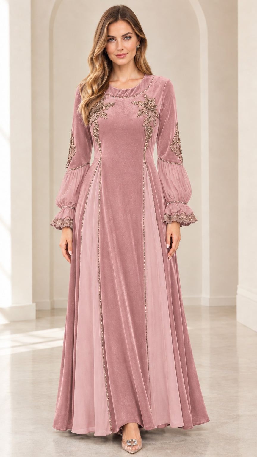 Model wearing dusty pink velvet embroidered evening gown with ruffled cuffs