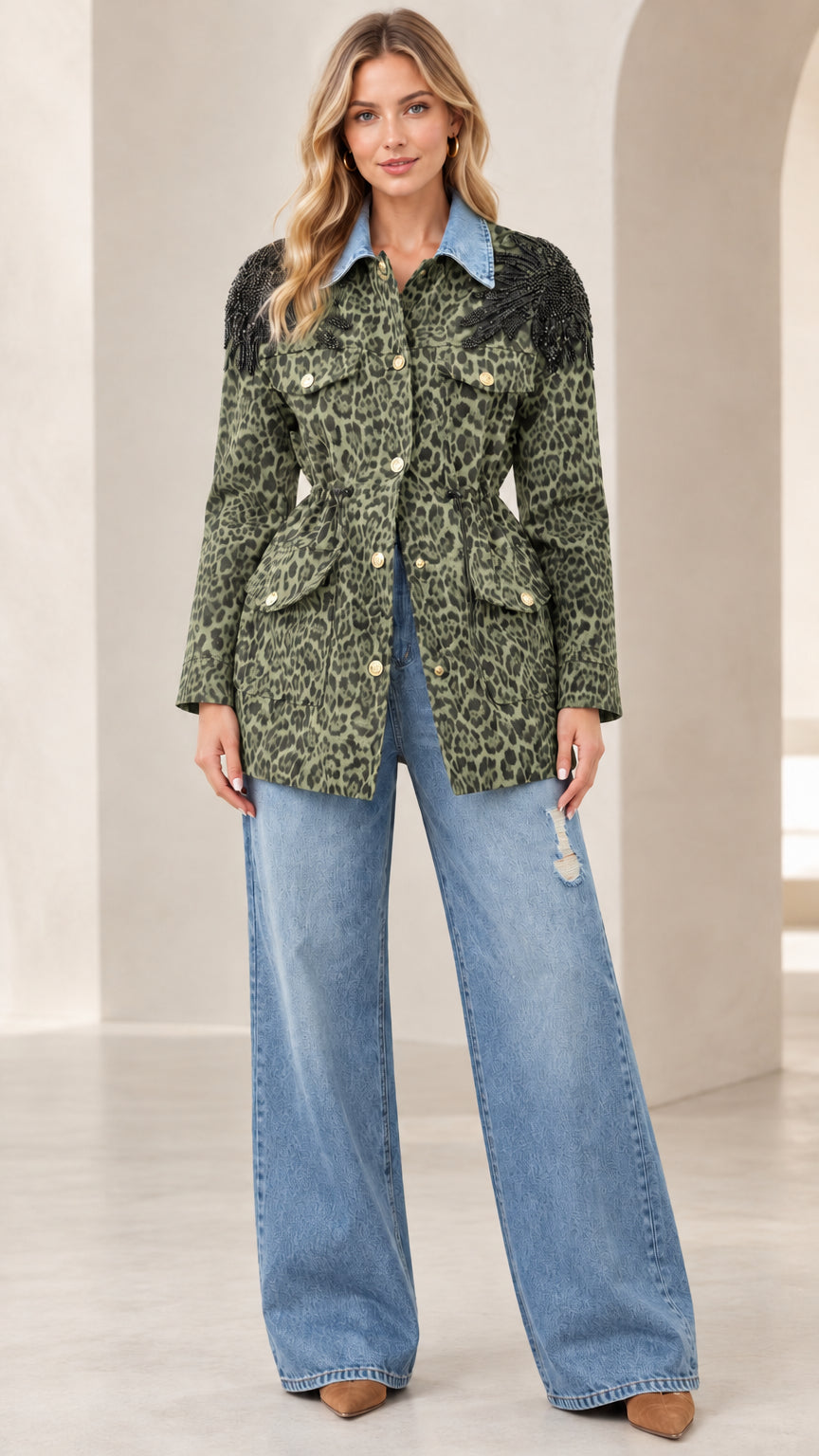 Model wearing olive green leopard print jacket with contrast denim collar