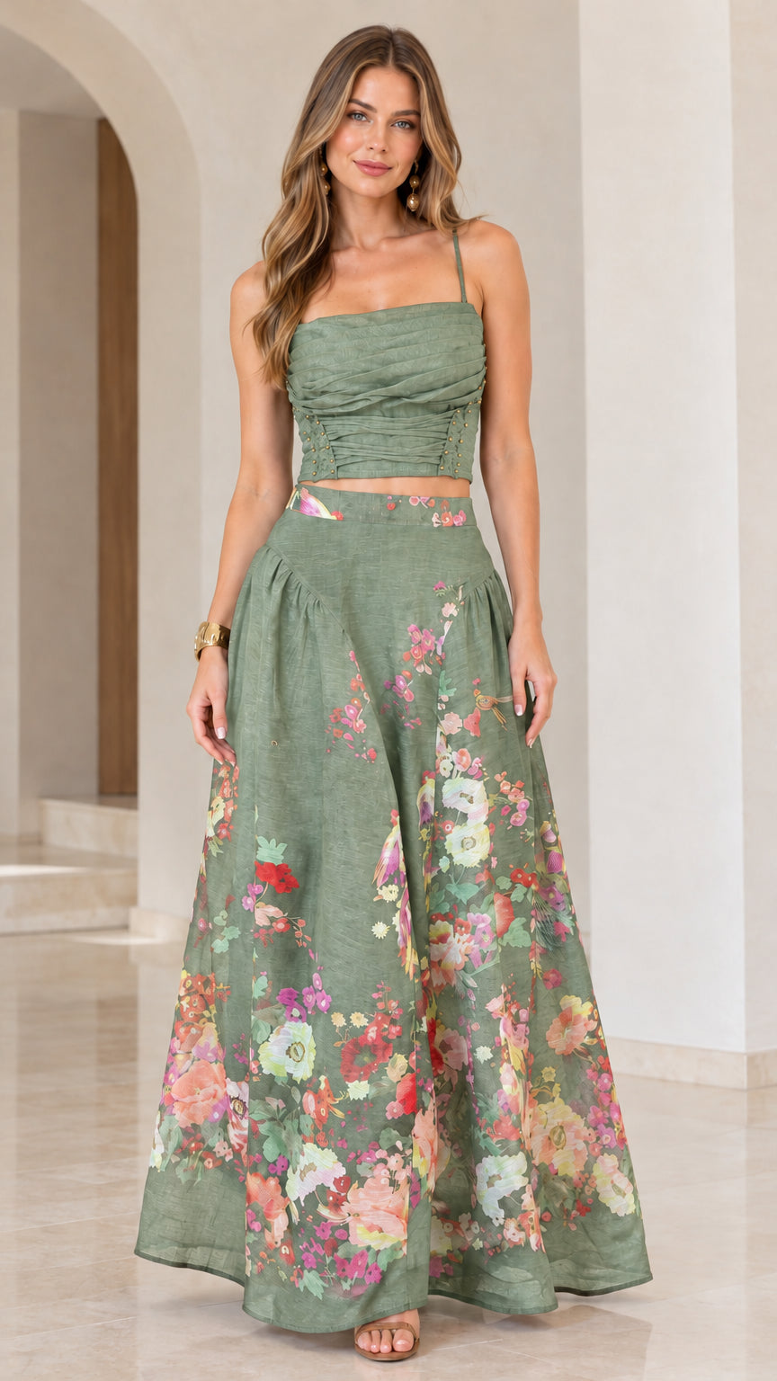 Full-length view of sage green floral two-piece crop top and sweeping maxi skirt set