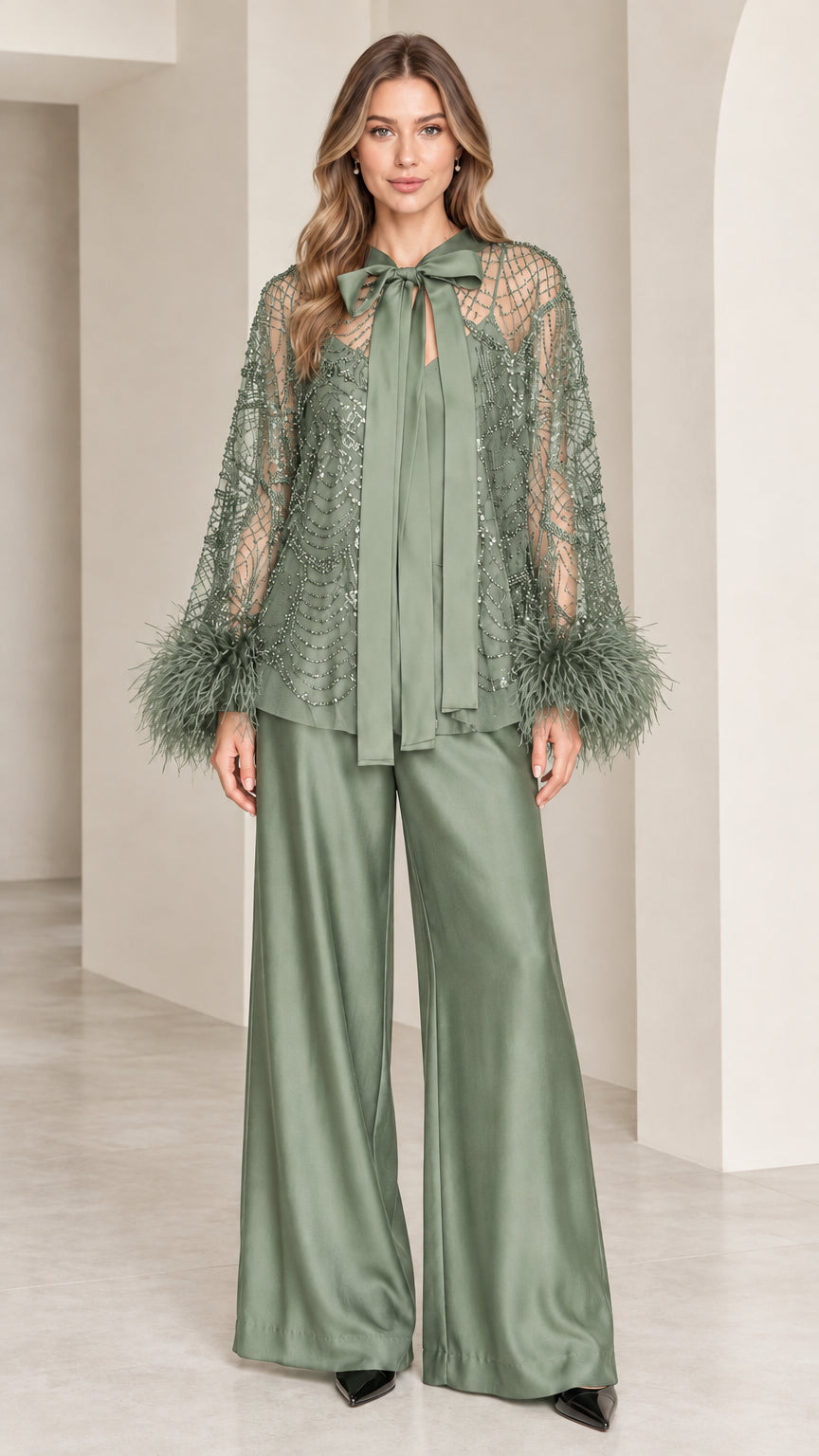 Sage green beaded bow top and matching wide-leg trousers