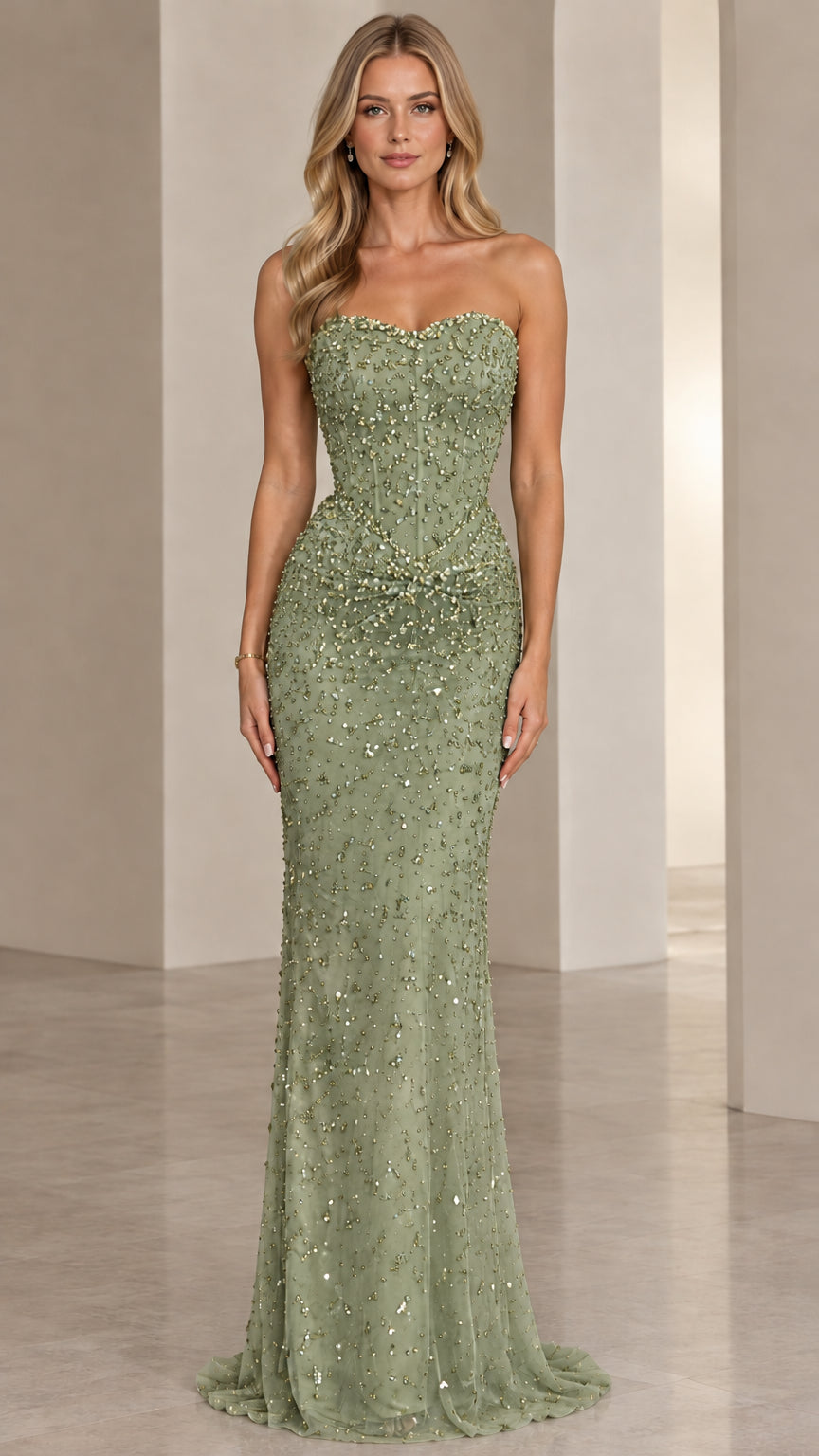 Front view of model wearing Sage Green strapless beaded corset evening gown
