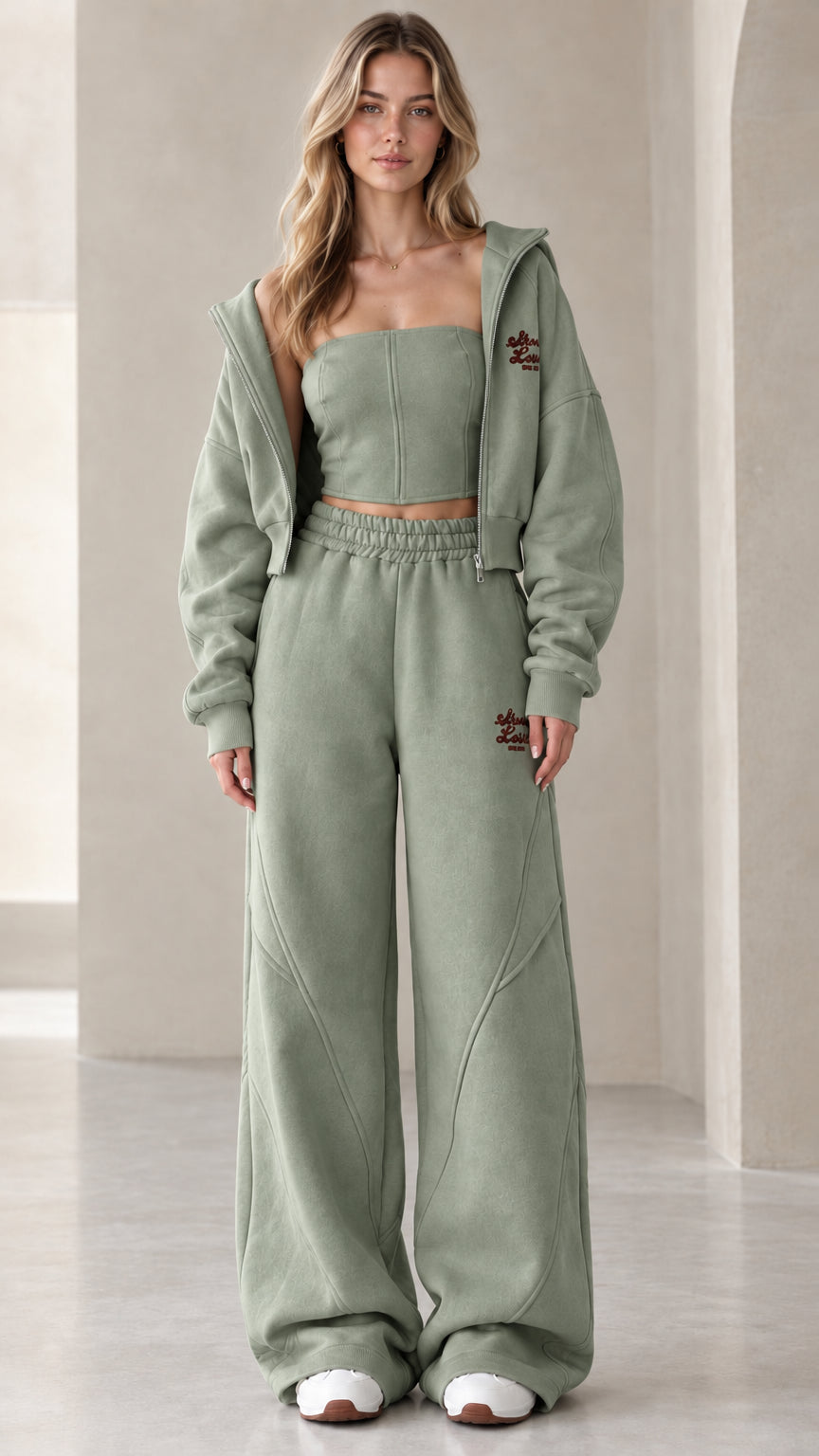 Full front view of model wearing the sage green 3-piece fleece tracksuit set