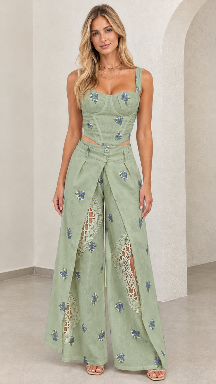 Model wearing sage green floral embroidered two piece corset pant set