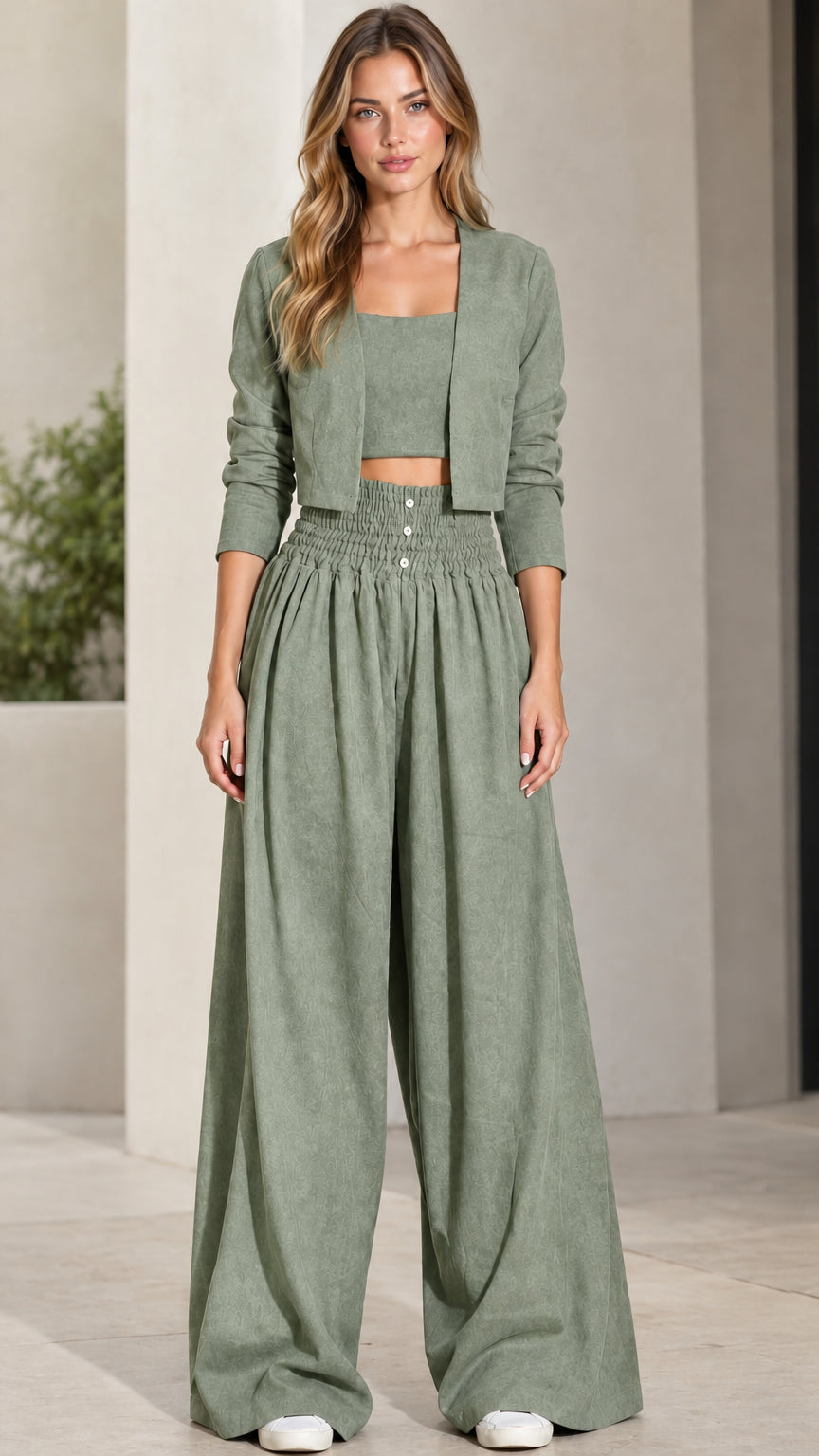 Front view of model wearing sage green 3-piece crop top, jacket, and wide-leg pants set