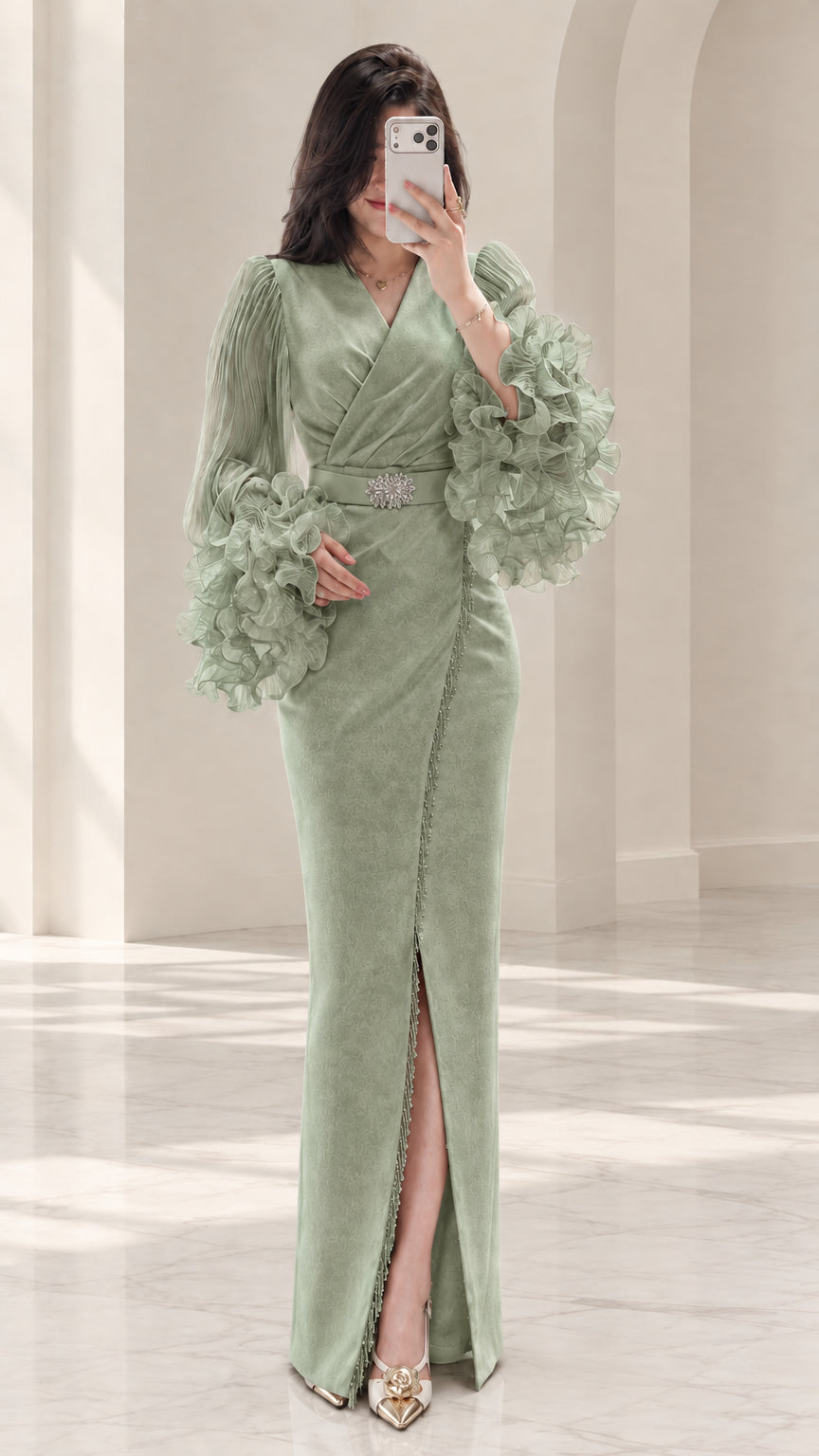 Sage green wrap maxi evening dress with dramatic ruffle sleeve cuffs